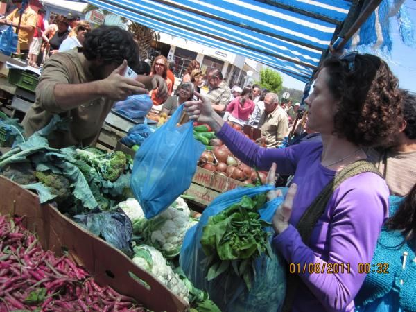 Mary McConneloug scores at the farmer's market.