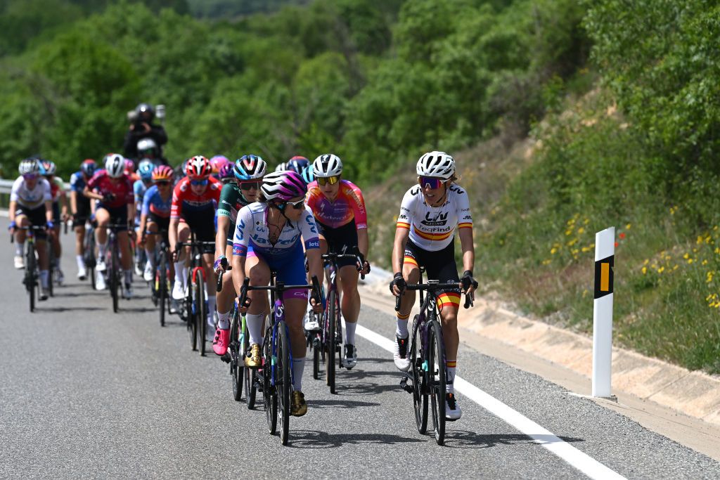 Kristen Faulkner of Jayco-Alula and Mavi Garcia of Liv Racing TeqFind at the front of the peloton