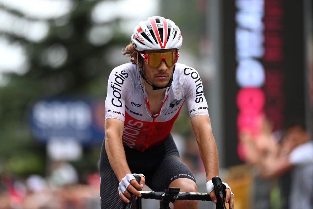 COGNE ITALY MAY 22 Guillaume Martin of France and Team Cofidis crosses the finish line during the 105th Giro dItalia 2022 Stage 15 a 177km stage from Rivarolo Canavese to Cogne 1622m Giro WorldTour on May 22 2022 in Cogne Italy Photo by Tim de WaeleGetty Images