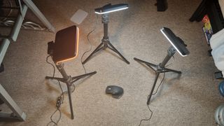 A mouse surrounded by Neewer Basics lights