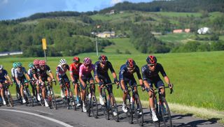 Ineos Grenadiers lead the peloton on stage 12