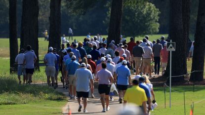 Golf fans walk away from shot at the 2024 Sanderson Farms Championship