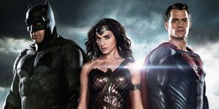 Batman v Superman: Dawn of Justice Batman, Wonder Woman, and Superman posing in front of some clouds