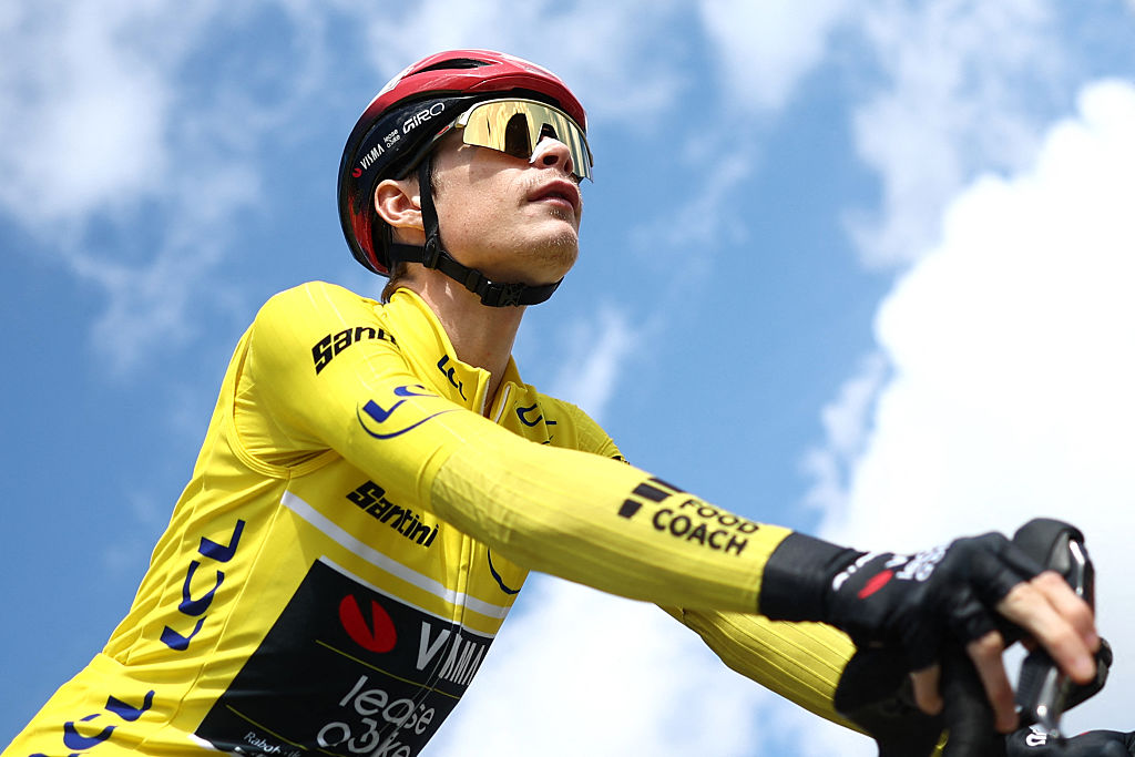 Team Visma - Lease a Bike's Danish rider Jonas Vingegaard waits for the start of the 5th stage of the Paris-Nice cycling race, 206.3 km between Cormoranche-sur-Sa&ocirc;ne and Colombier-le-Vieux, on March 12, 2026. (Photo by Anne-Christine POUJOULAT / AFP)