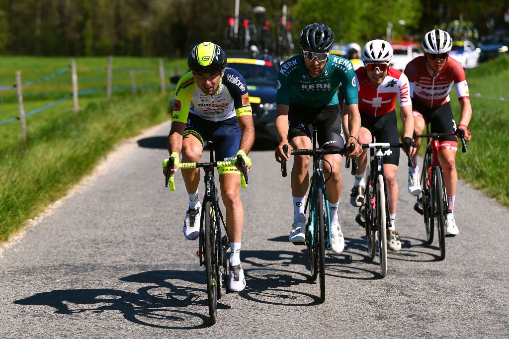 OULENSSOUSECHALLENS SWITZERLAND APRIL 28 LR Baptiste Planckaert of Belgium and Team Intermarch Wanty Gobert Matriaux Diego Lpez Fuentes of Spain and Equipo Kern Pharma Nils Brun of Switzerland and Team Switzerland and Toms Skujins of Latvia and Team Trek Segafredo compete in the breakaway during the 75th Tour De Romandie 2022 Stage 2 a 1682km stage from challens to challens TDR2022 on April 28 2022 in OulenssousEchallens Switzerland Photo by Dario BelingheriGetty Images