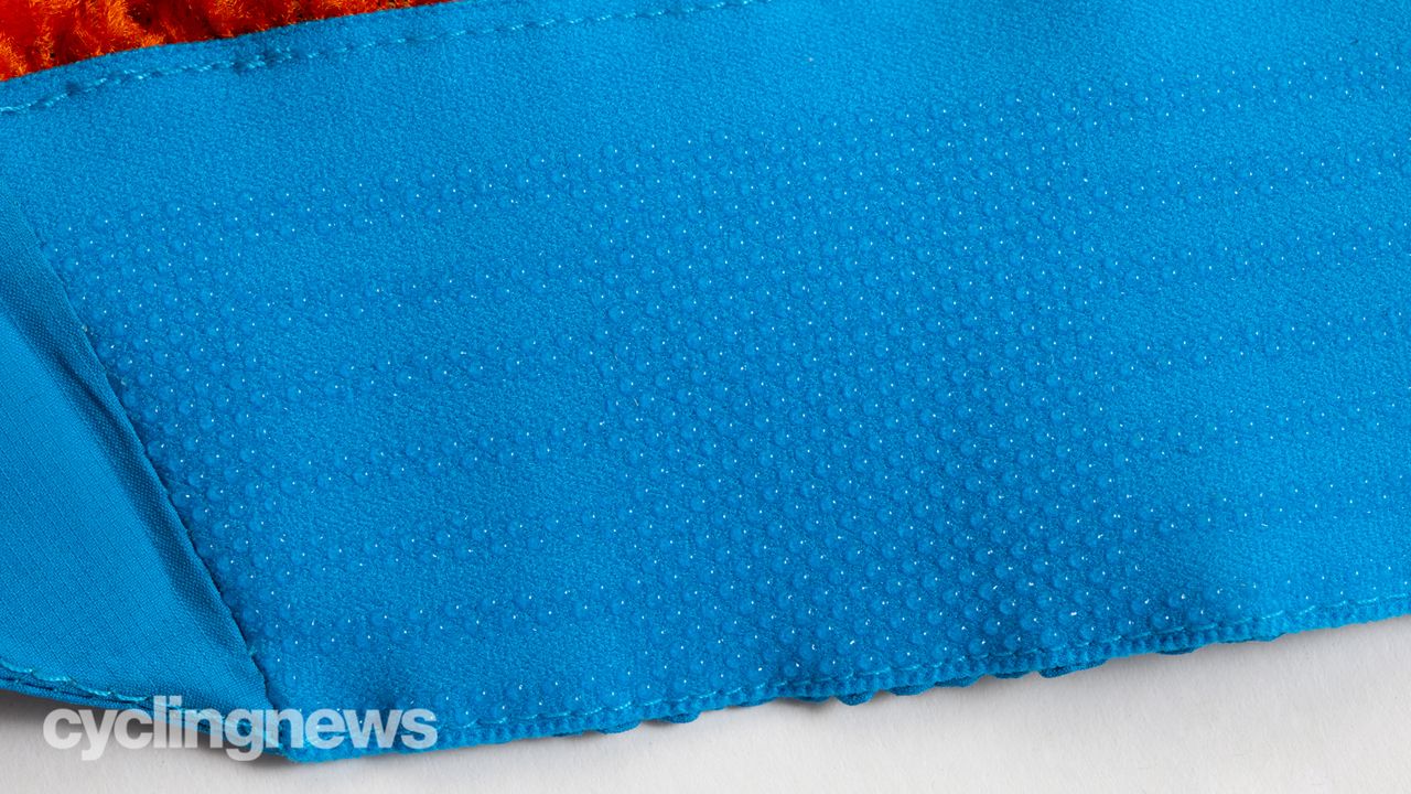 Rapha Pro Team Insulated Gore-Tex Rain Jacket detail of rear drop tail silicone gripper