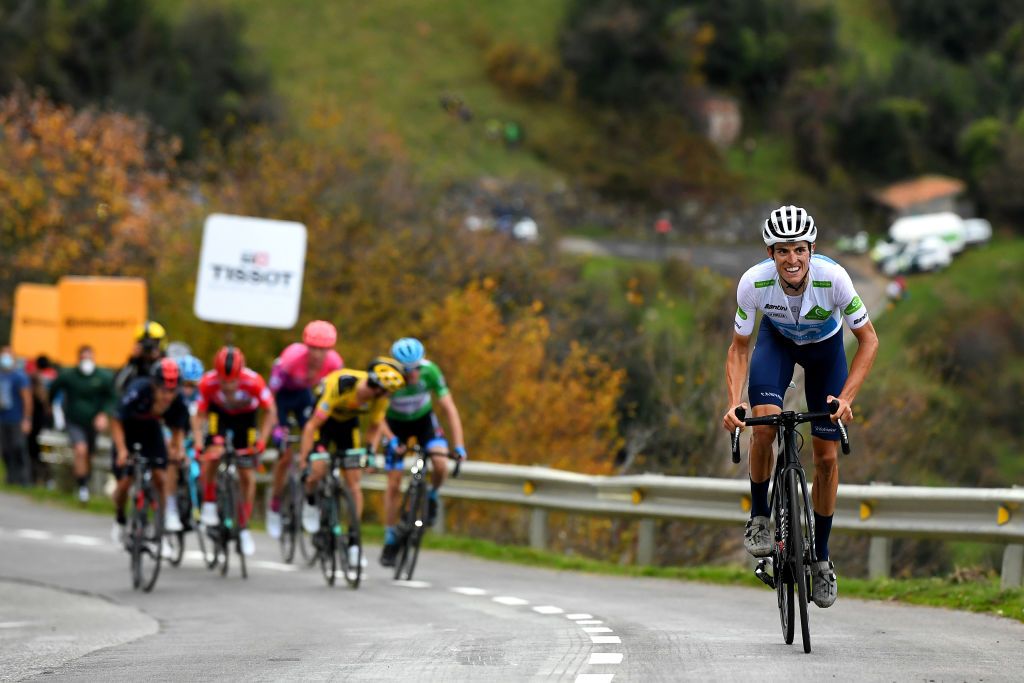 ALTODELANGLIRU SPAIN NOVEMBER 01 Enric Mas Nicolau of Spain and Movistar Team White Best Young Jersey Daniel Martin of Ireland and Team Israel StartUp Nation Green Points Jersey Sepp Kuss of The United States and Team Jumbo Visma Primoz Roglic of Slovenia and Team Jumbo Visma Red Leader Jersey Richard Carapaz of Ecuador and Team INEOS Grenadiers Hugh Carthy of The United Kingdom and Team EF Pro Cycling Aleksander Vlasov of Russia and Astana Pro Team Breakaway Mountains Landscape during the 75th Tour of Spain 2020 Stage 12 a 1094km stage from Pola de Laviana to Alto de lAngliru 1560m lavuelta LaVuelta20 La Vuelta on November 01 2020 in Alto de lAngliru Spain Photo by David RamosGetty Images