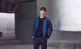 Model wearing Blue trousers, t-shirt and jacket