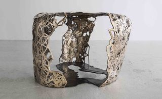 Geometric Lattice Ribbon’ table in bronze