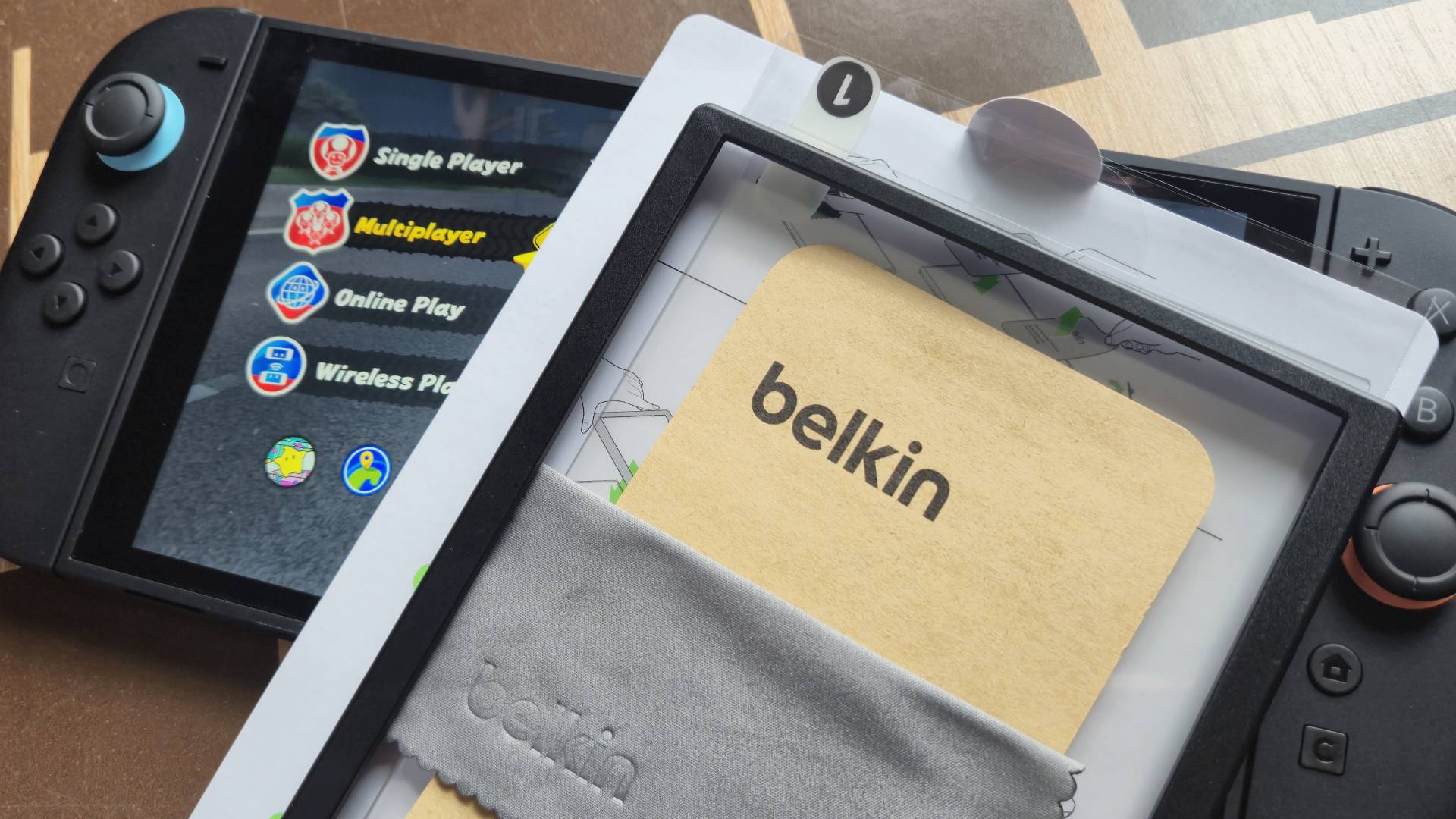 Photo by Rosalie Newcombe of the Belkin Switch 2 screen protector sitting on top of a Nintendo Switch 2.