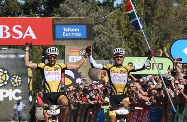Christoph Sauser of 36One-Songo-Specialized and Burry Stander of 36One-Songo-Specialized celebrate after winning the Cape Epic
