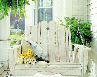 Distressed white Wyton porch swing available at Wayfair