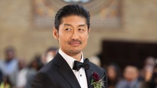 Brian Tee as Ethan Choi at his wedding in Chicago Med Season 8