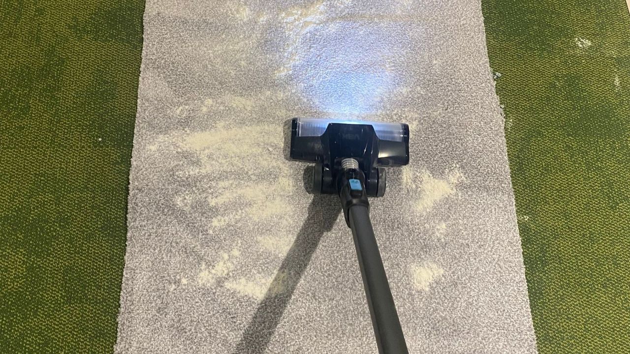The Hoover vacuum sucking up flour from the floor