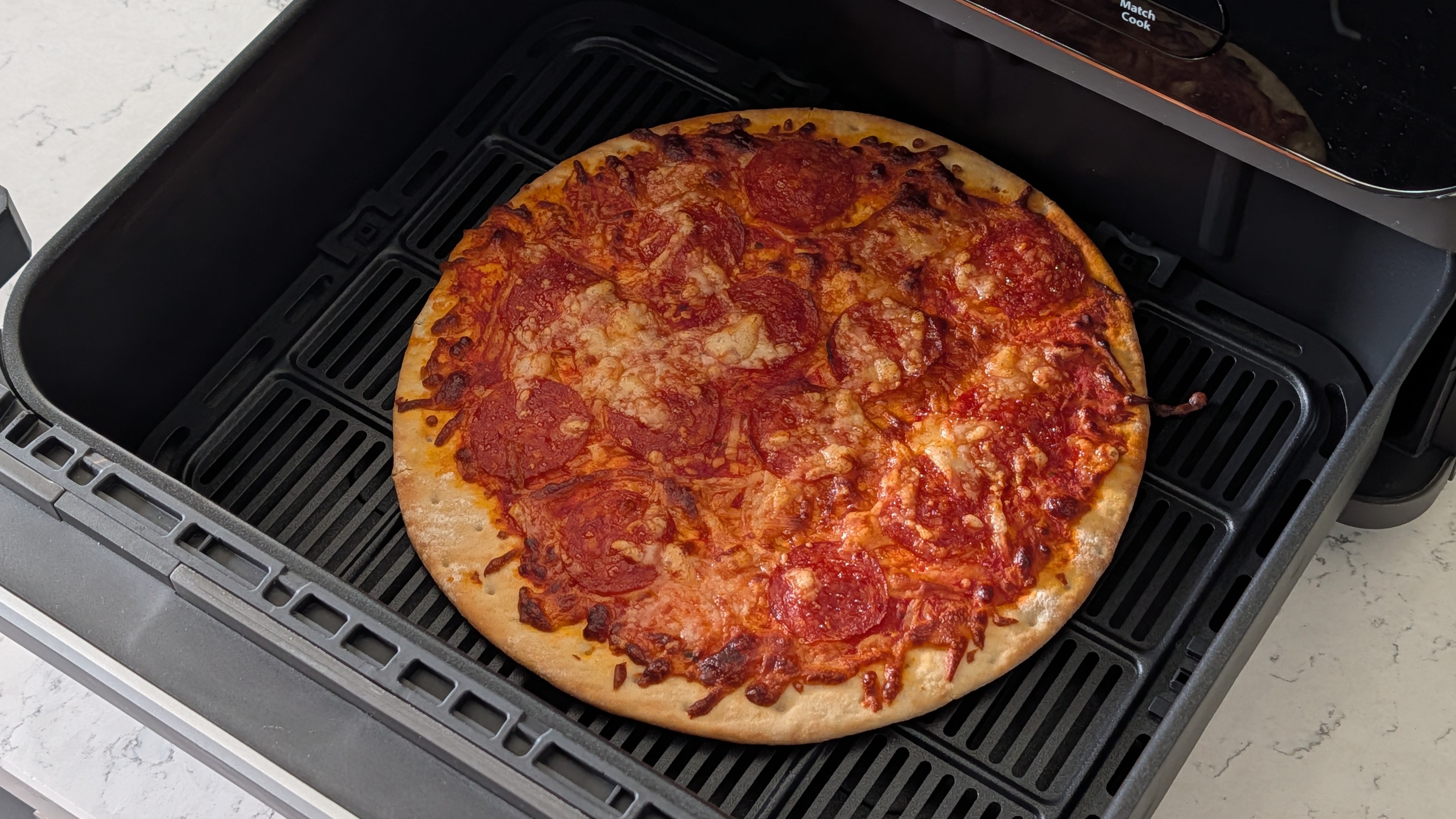 Pizza cooked in air fryer