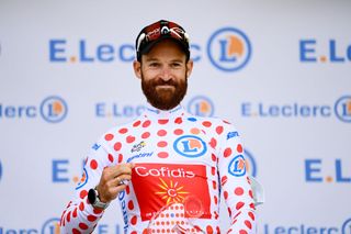 SERRE CHEVALIER FRANCE JULY 13 Simon Geschke of Germany and Team Cofidis Polka Dot Mountain Jersey celebrates at podium during the 109th Tour de France 2022 Stage 11 a 1517km stage from Albertville to Col de Granon Serre Chevalier 2404m TDF2022 WorldTour on July 13 2022 in Col de GranonSerre Chevalier France Photo by Tim de WaeleGetty Images