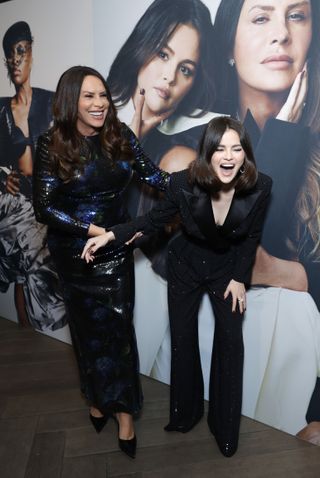 A photo of Gomez sharing a laugh with her Emilia Pérez co-star Karla Sofía Gascón.