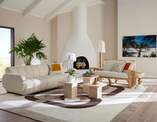 Jonathan Adler - Living room - Brigitte sofa in boucle, Travertine nesting tables and Riviera settee