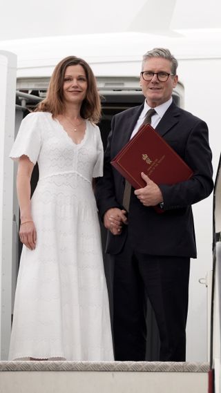 Prime Minister Sir Keir Starmer and his wife Victoria board a plane at Stansted Airport in Essex as they head to Washington DC to attend a Nato summit on July 9, 2024