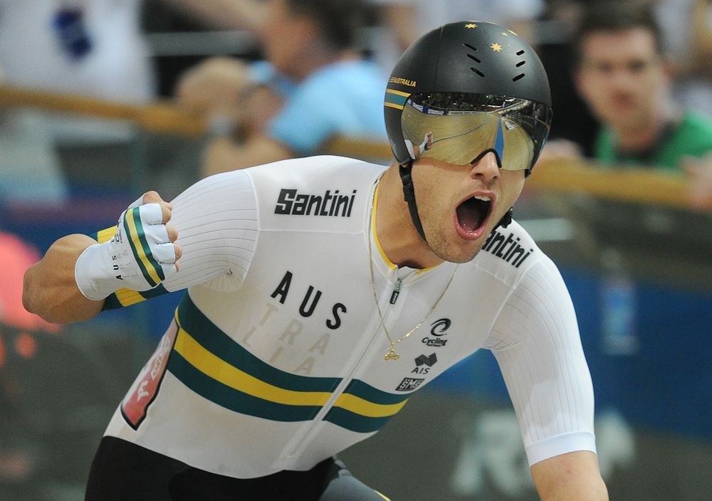Australia's Samuel Welsford celebrates winning the Men's Scratch Race