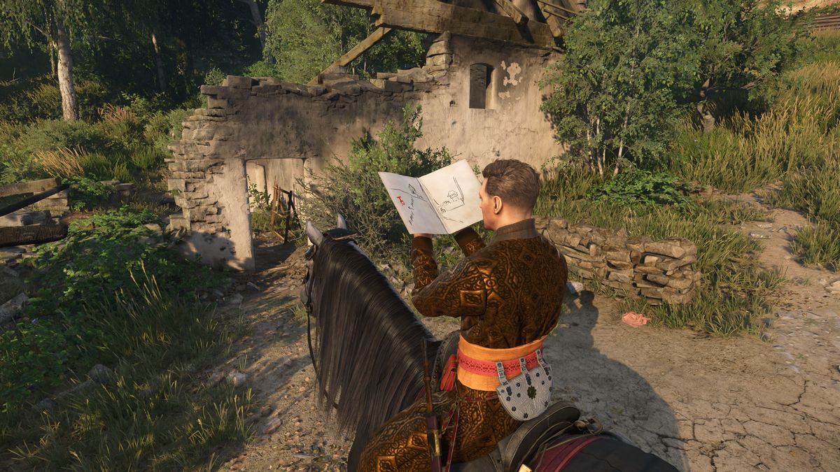 KCD 2 treasure map - Henry reading a map in front of a ruin