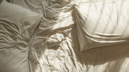 How often should you have sex?: A crumpled bedsheet and pillow