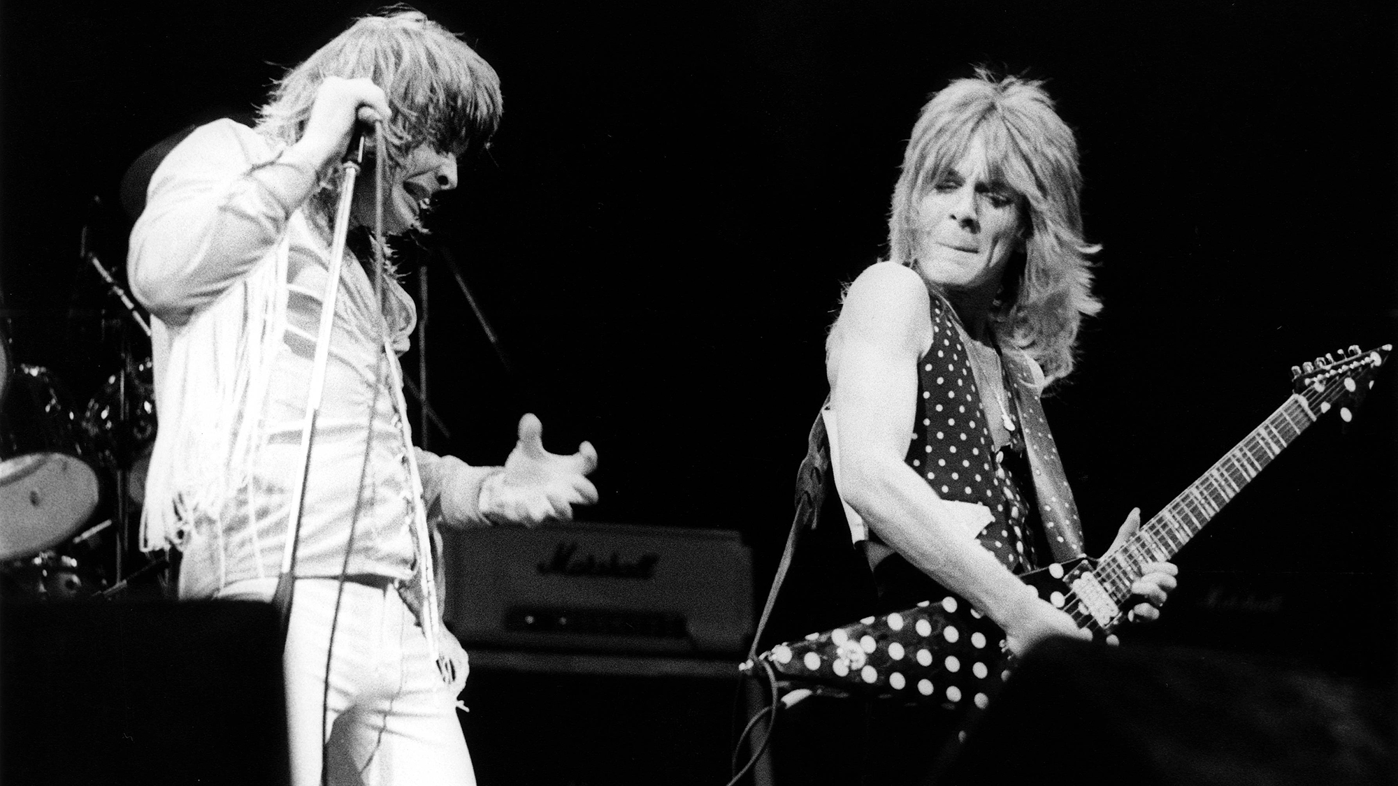 Photo of Randy RHOADS and Ozzy OSBOURNE; with his guitarist Randy Rhoads, performing live onstage at Gaumont Theatre