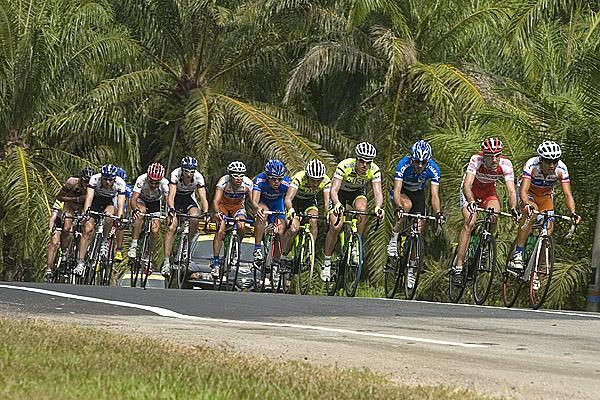 Riders make their way on the outskirts of Mersing during stage four.