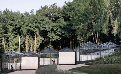 A modern glasshouse that doubles as event space has appeared in Omved Gardens