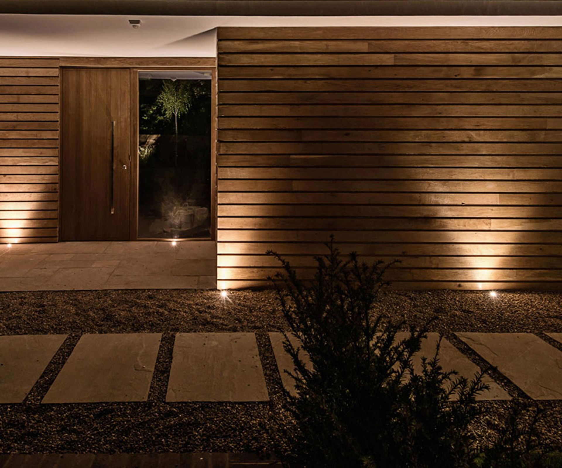front yard with gravel and lighting