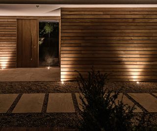 front yard with gravel and lighting