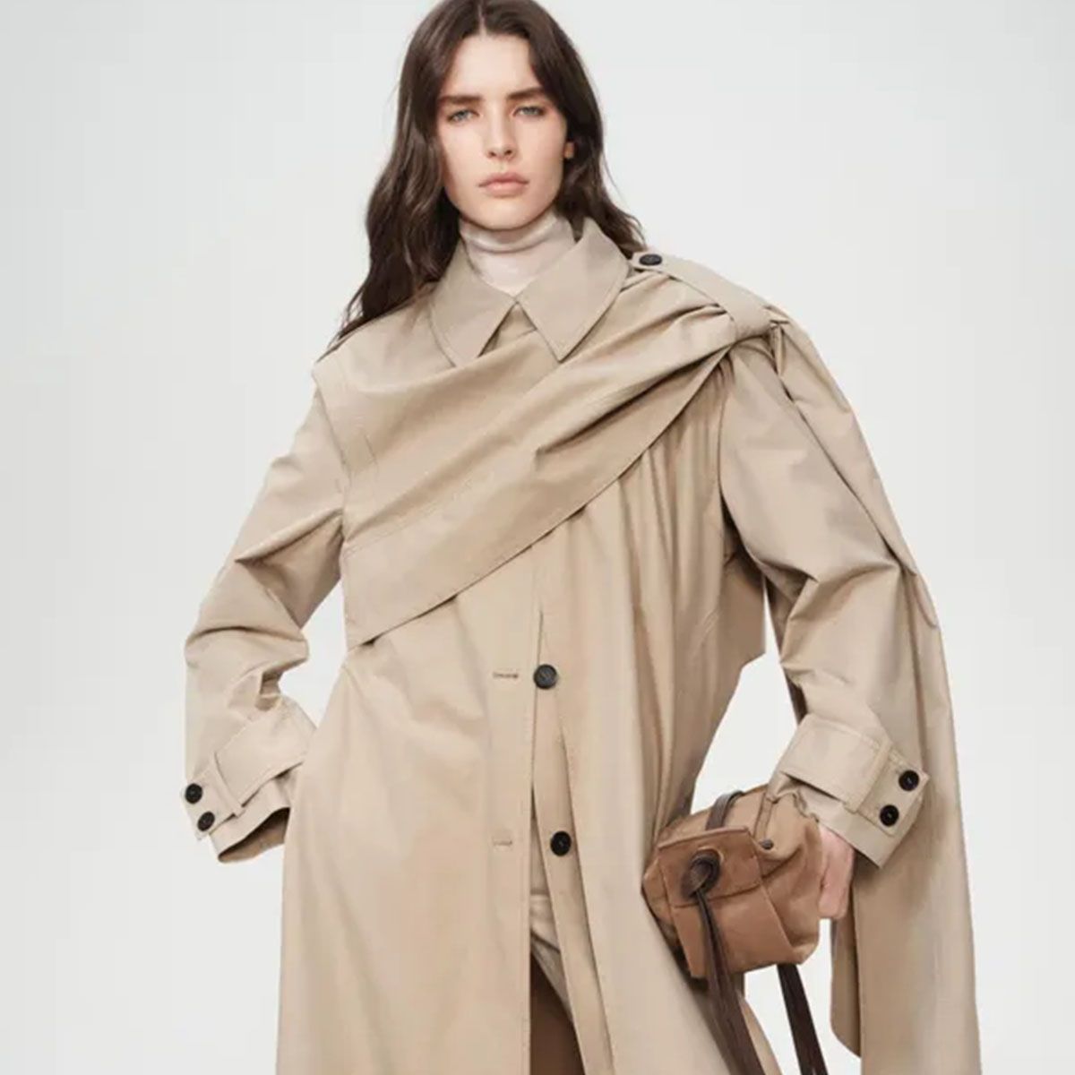 Woman in a scarf trench coat