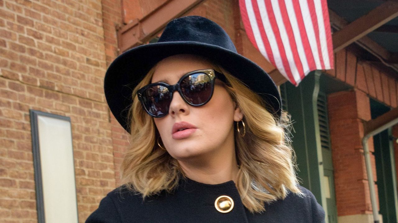 Adele&#039;s oversized sunglasses and hoop earrings have fans asking same thing