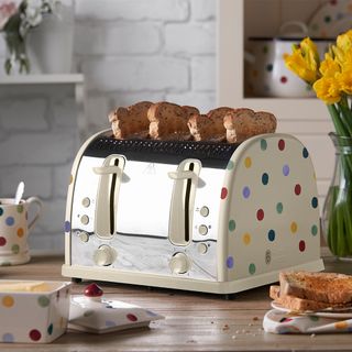 polka dotted toaster on wooden table