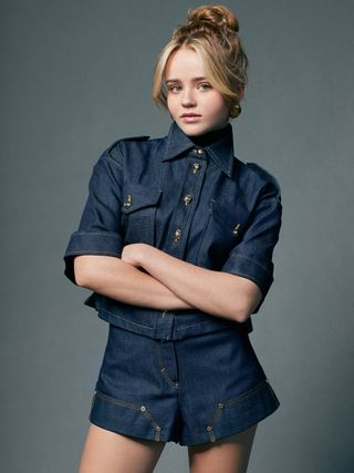 Megan Stott wears a denim shirt and short set.