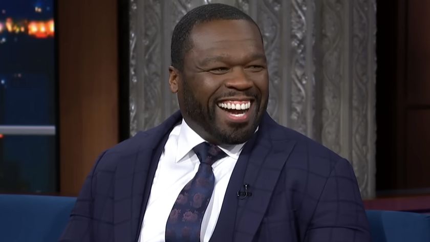 50 Cent laughs on The Late Show with Stephen Colbert.