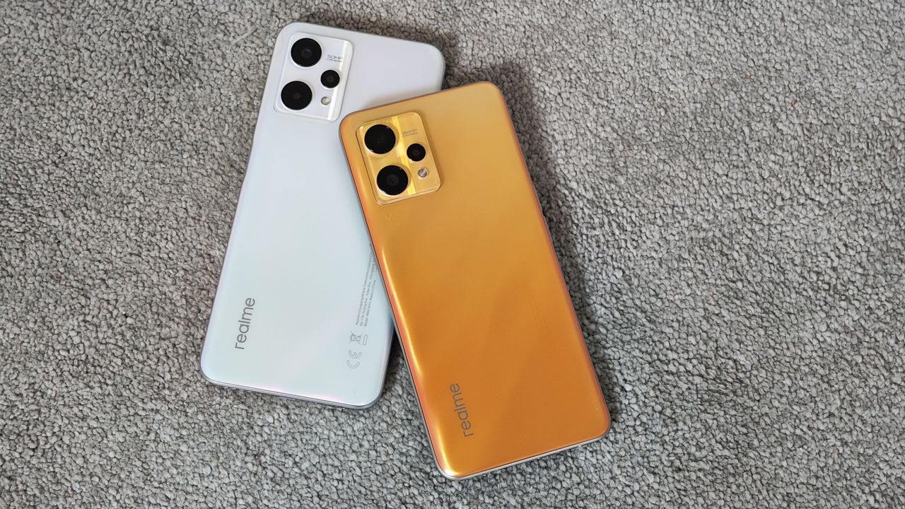 Realme 9 vs Realme 9 5G UK release handsets on grey carpet