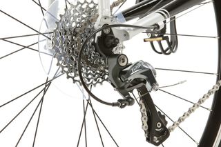 Rear mech has long cage to handle a wide gear range
