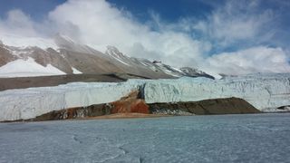 Scientists drilled through the Blood Falls glacier (seen here) in Antarctica in a test that could pave the way toward a first-of-its-kind mission to drill into the ice shell of Saturn's icy moon Enceladus.