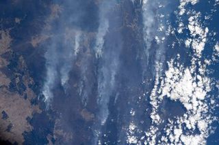 NASA astronaut Christina Koch shared this image of smoke towering over Australia on Jan. 14, 2020.