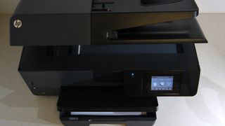 The OfficeJet Pro 6830 is an inkjet with a scanner and ADF on top