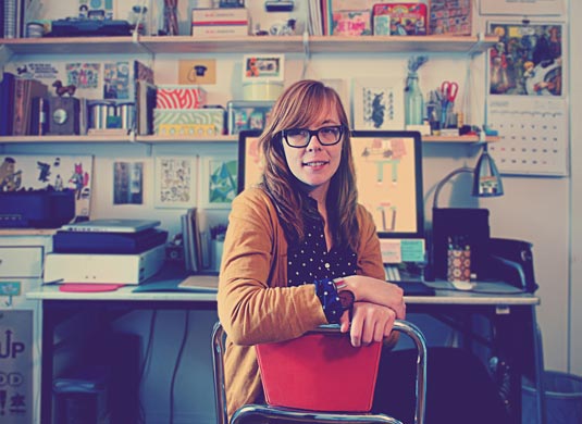 Lydia Nicholls at desk