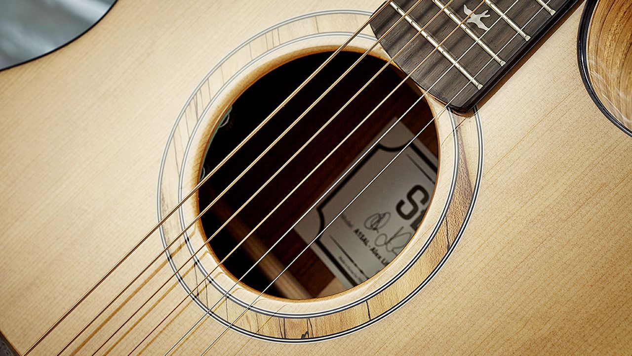 The soundhole sports a classy looking wood-inlaid rosette