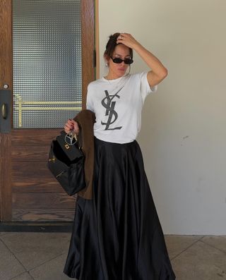 influencer wearing a T-shirt over skirt outfit