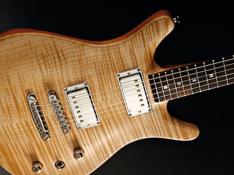 That beautiful maple top looks even better strapped on