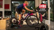Image shows cyclist riding Tacx Neo trainer