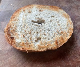 Testing a bagel in the KitchenAid Pro Line 2-Slice Toaster