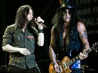 Myles Kennedy and Slash performing in Rome, 2011. Last night, Kennedy joined the guitarist and other original Guns N' Roses members at the Rock And Roll Hall Of Fame ceremony