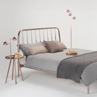 bed with cushions