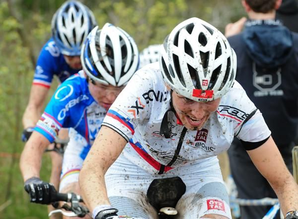 Riders head uphill, hoping that nobody in front of them gets off her bike.
